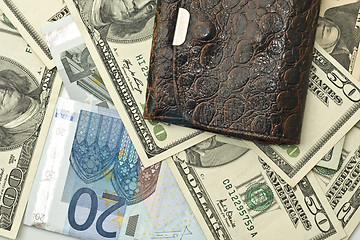 Image showing Saving the money - old wallet, US dollars