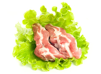 Image showing Pieces of Pork meat on green salad