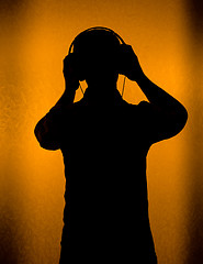 Image showing Music - silhouette of DJ with headset