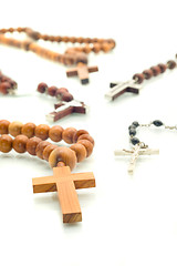 Image showing Religion diversity - rosary beads over white