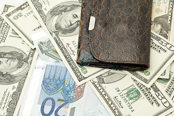 Image showing Wealth - old wallet, US dollars and euro