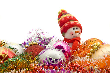 Image showing Lovely white snowman and decoration baubles