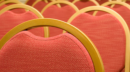 Image showing Closeup of red Chair in the conference hall