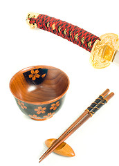 Image showing Japanese katana, Chopsticks and bowl 