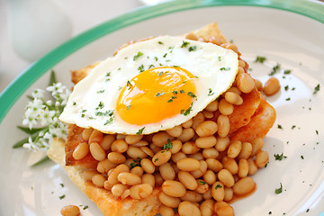 Image showing Egg On Baked Beans