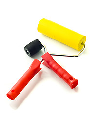 Image showing Two colorful rollers for renovation