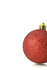 Image showing Christmas Decoration - single red ball over white 