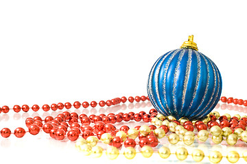 Image showing Christmas decoration - colorful beads and striped blue ball 