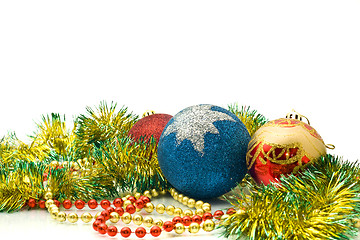 Image showing Christmas Decoration - colorful tinsel and balls