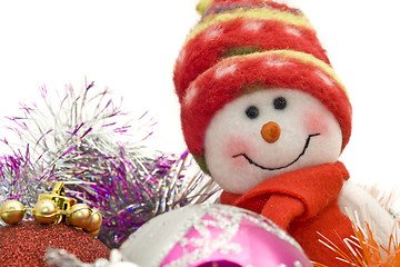 Image showing Cute Xmas snowman and decoration baubles