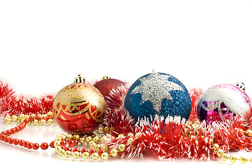 Image showing Beautiful Christmas decoration - colorful tinsel and balls 