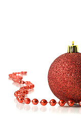 Image showing Christmas is coming. Red Decoration ball and red tinsel