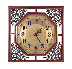 Image showing Antique wall clock with carved wooden frame