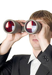 Image showing Businessman with binoculars searching