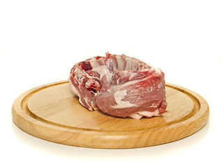 Image showing Raw meat on round hardboard