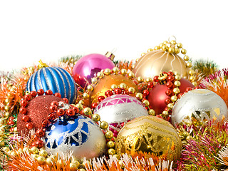 Image showing Beautiful Christmas decoration - balls and colorful tinsel