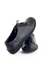 Image showing Pair of black leather shoes for women over white 