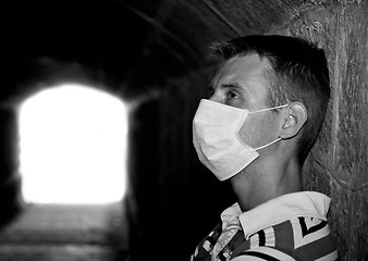 Image showing Male with Gauze bandage in dark tunnel 