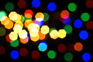 Image showing Blurred colorful lights over black