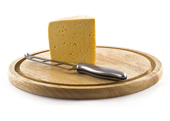 Image showing Knife and cheese on the board 