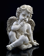 Image showing An angel and a dove