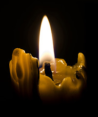 Image showing closeup of candle light in the darkness