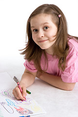 Image showing The girl draws