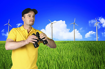 Image showing man and wind turbine  landscape