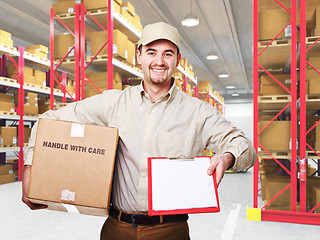 Image showing delivery man in warehouse
