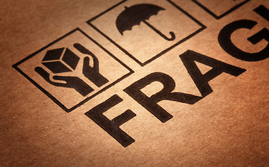 Image showing fine image close up of fragile symbol on cardboard