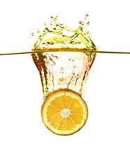 Image showing orange splash in water