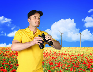 Image showing man and power wind station