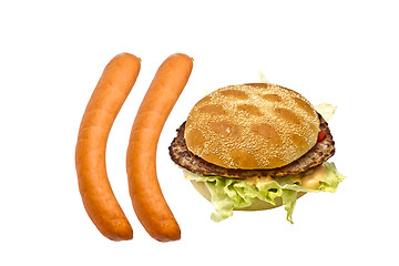 Image showing Delicious hamburger and sausages