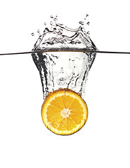 Image showing orange splash in water