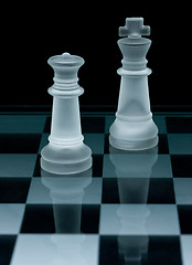 Image showing Macro shot of glass chess pieces against a black background