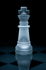 Image showing Macro shot of glass chess king against a black background