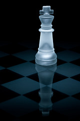 Image showing Macro shot of glass chess king against a black background