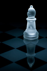 Image showing Macro shot of glass chess bishop against a black background