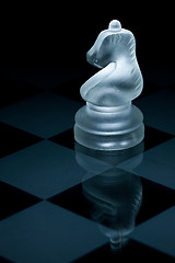 Image showing Macro shot of glass chess knight against a black background