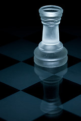 Image showing Macro shot of glass chess rook against a black background