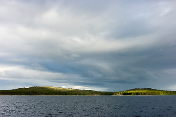 Image showing Island in the sea shined with sun beams