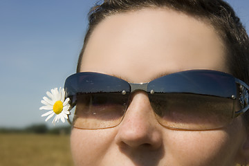 Image showing The girl in sunglasses