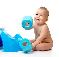 Image showing Child on potty