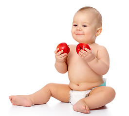 Image showing Little child with apple