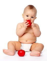 Image showing Little child with apple