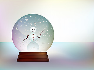 Image showing Glass ball with a snowman in a snowy landscape.