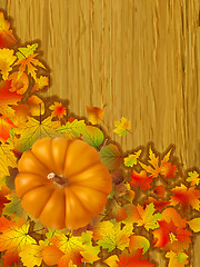 Image showing Fall leaves with orange gourd