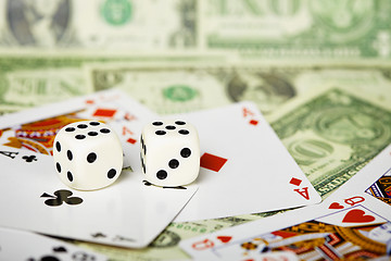 Image showing Dices are on cards and money