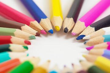 Image showing Several colored pencils arranged in circle