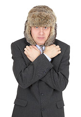 Image showing Hoarse waggish young man in fur hat